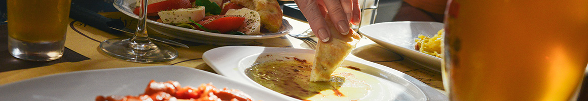 Eating Gastropub Spanish Tapas/Small Plates at entretapas restaurant in Weston, FL.